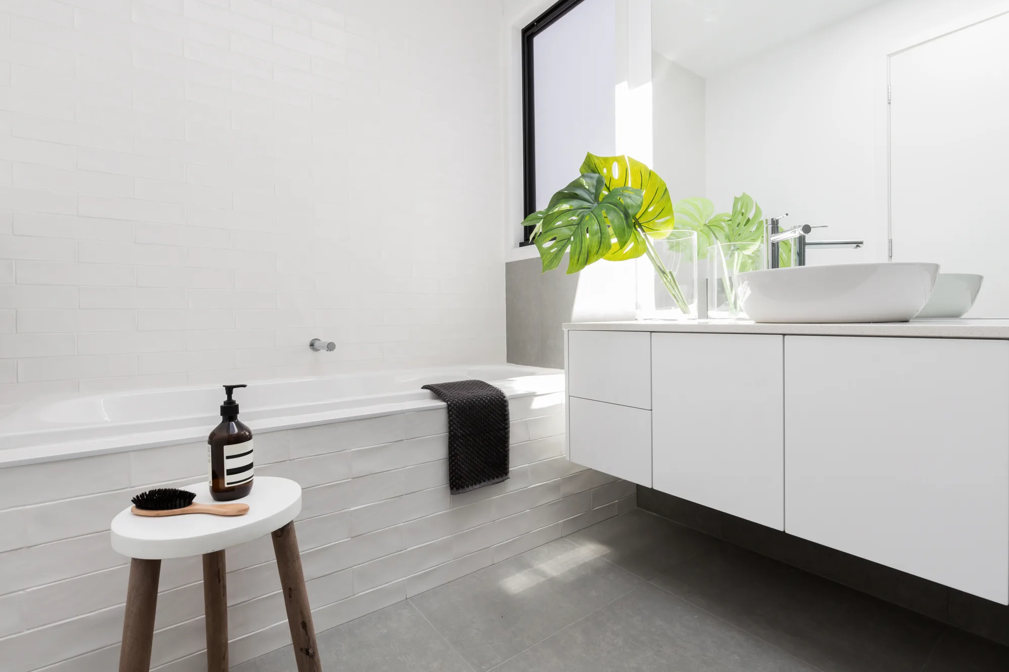 Bright bathroom with floating vanity
