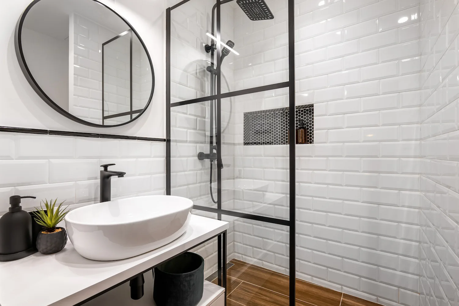 Modern bathroom with black-framed shower screen